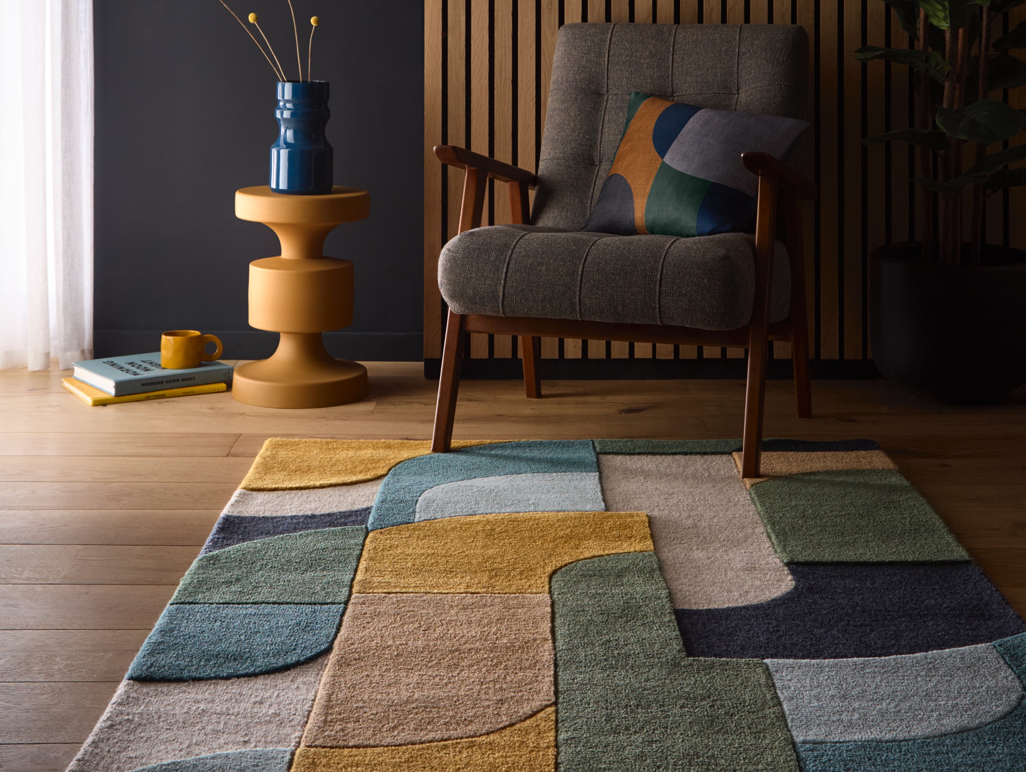 Retro Deco Wool Rug, styled on wooden flooring.