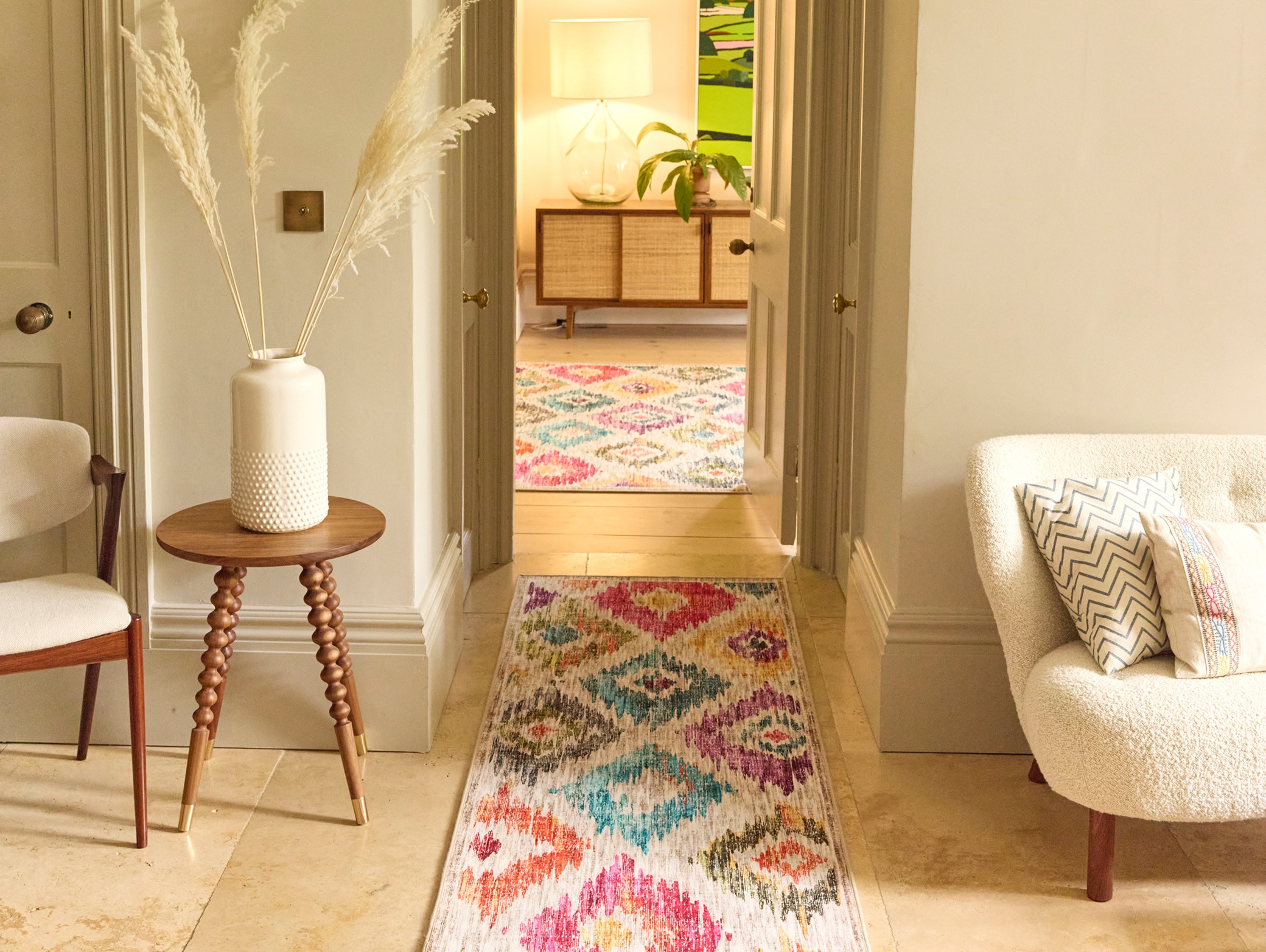 Painted Ikat Eco-Washable Runner, styled on wooden flooring.