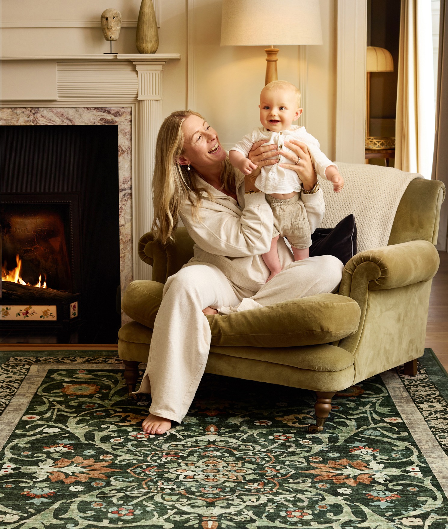 Country Paisley Green Eco-Washable Rug, styled in a living room.