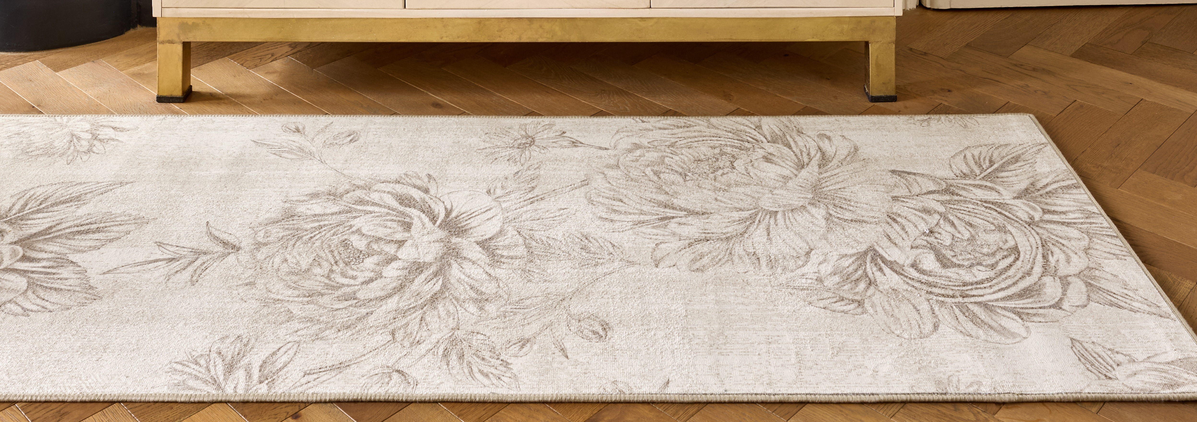 Muted Floral Beige Eco-Washable Runner, styled on wooden flooring.