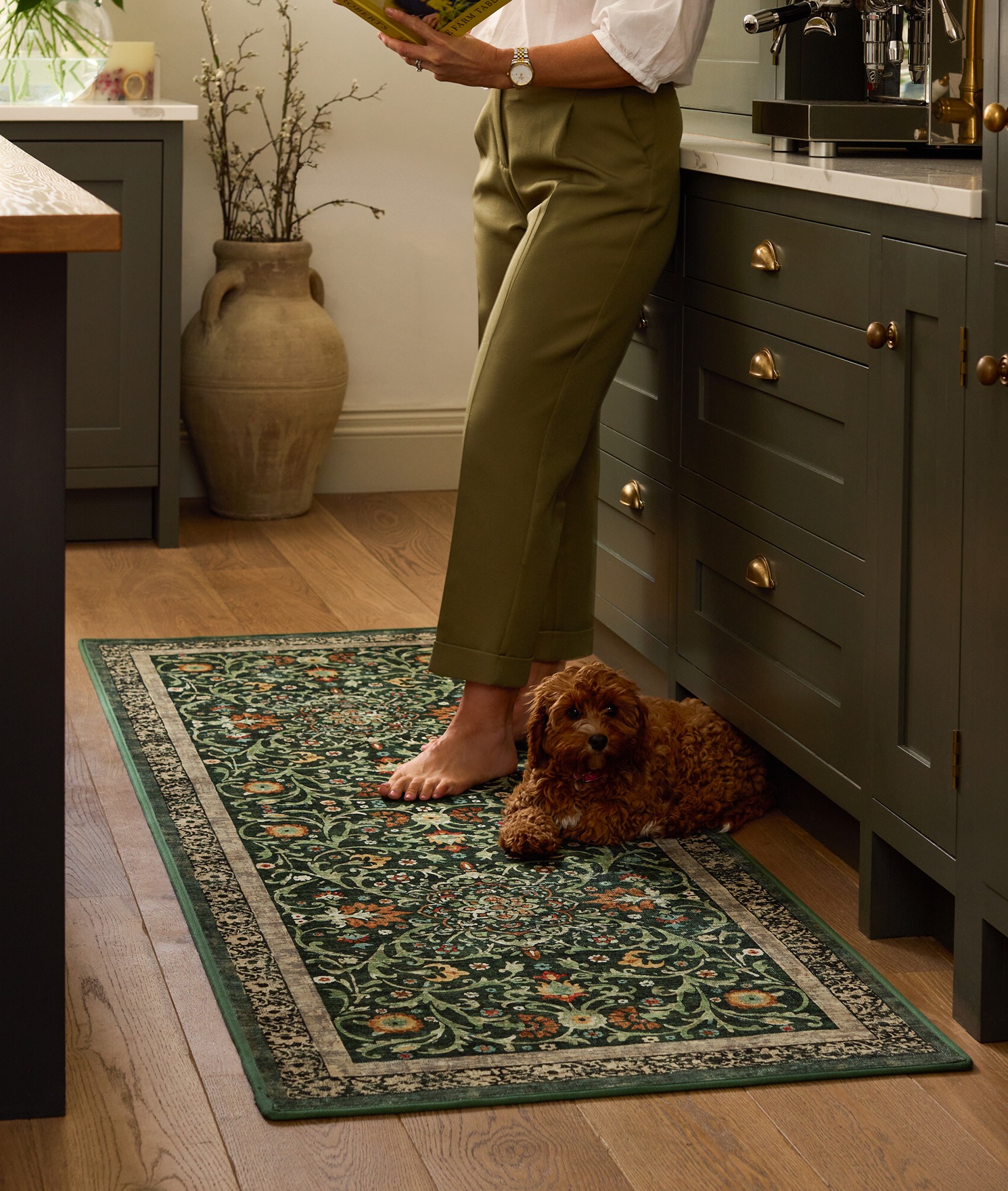 Country Paisley Green Eco-Washable Runner, styled in a kitchen.