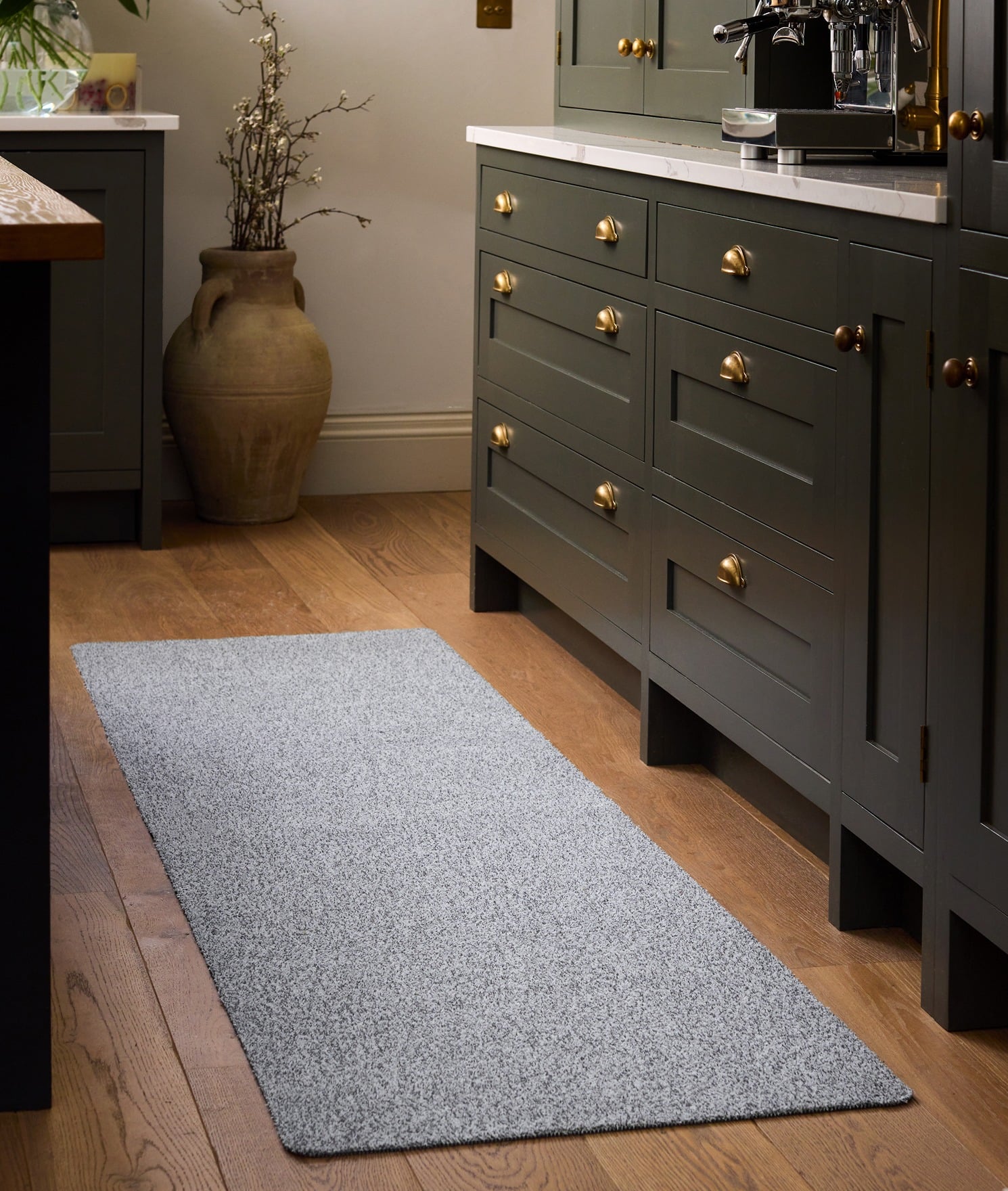 Plain Fleck Silver Washable Runner, styled in a kitchen.