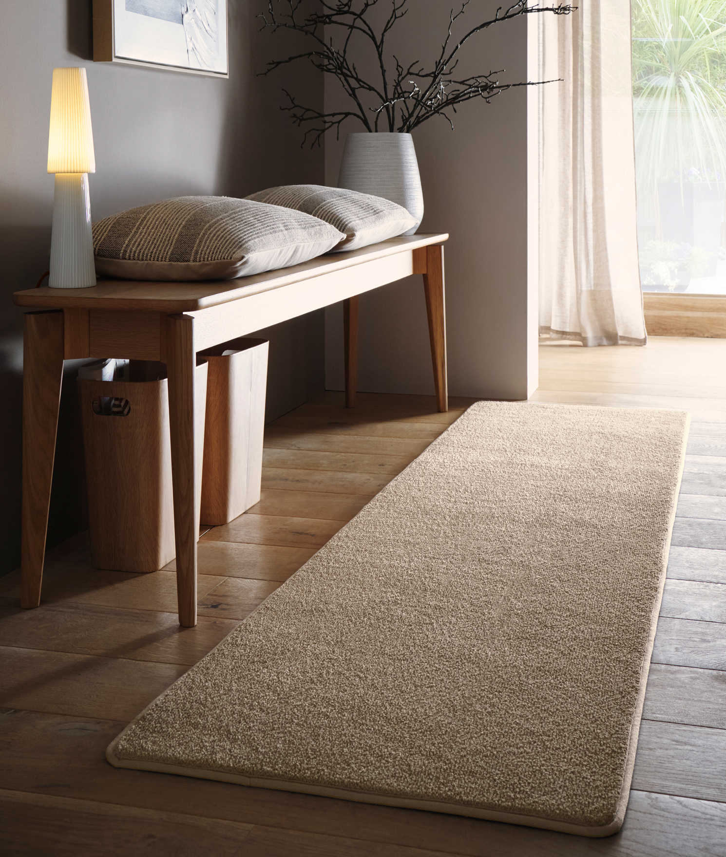 Sense Beige Washable Rug Runner, styled on wooden flooring.